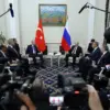 Turkish President Tayyip Erdogan meets with Russian President Vladimir Putin on the sidelines of the